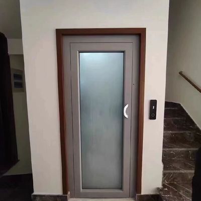 0 मीटर गड्ढे की गहराई और डेक के फर्श के दरवाजे के साथ आवासीय स्वचालित एकल चरण एसी श्रील लिफ्ट